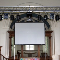 Lighting, projection and screen at a Church event